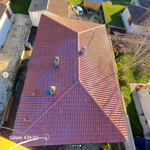 Lavage et traitement de toiture